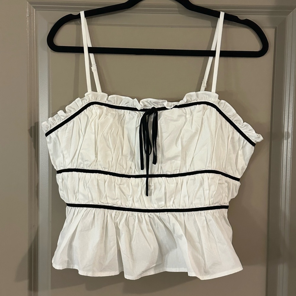 White Ruffled Women's Top with Black Accents